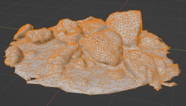 A photoscanned 3D model of rocks with reduced geometry after applying the decimate modifier in Blender.